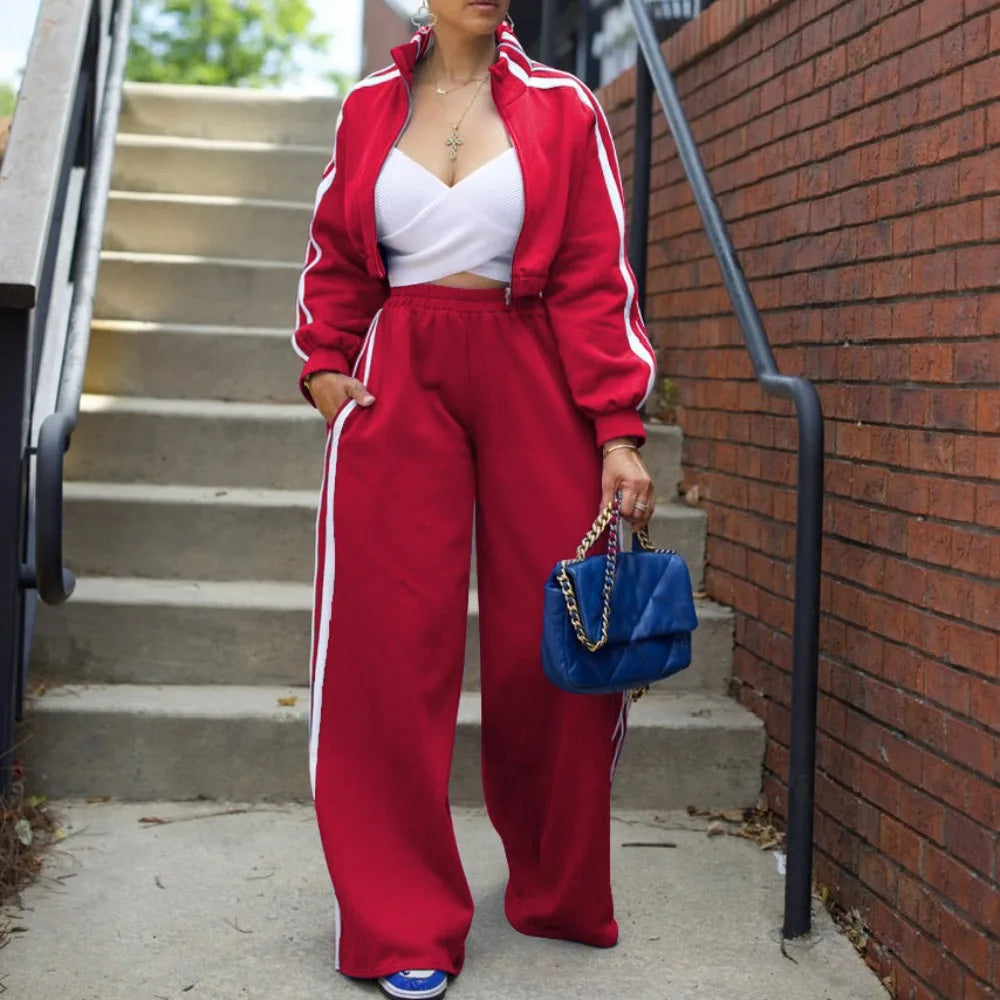 Women’s wide-leg pants suit by JN Fashion Fusion featuring a striped jacket and floor-length trousers, casual autumn 2-piece ensemble.