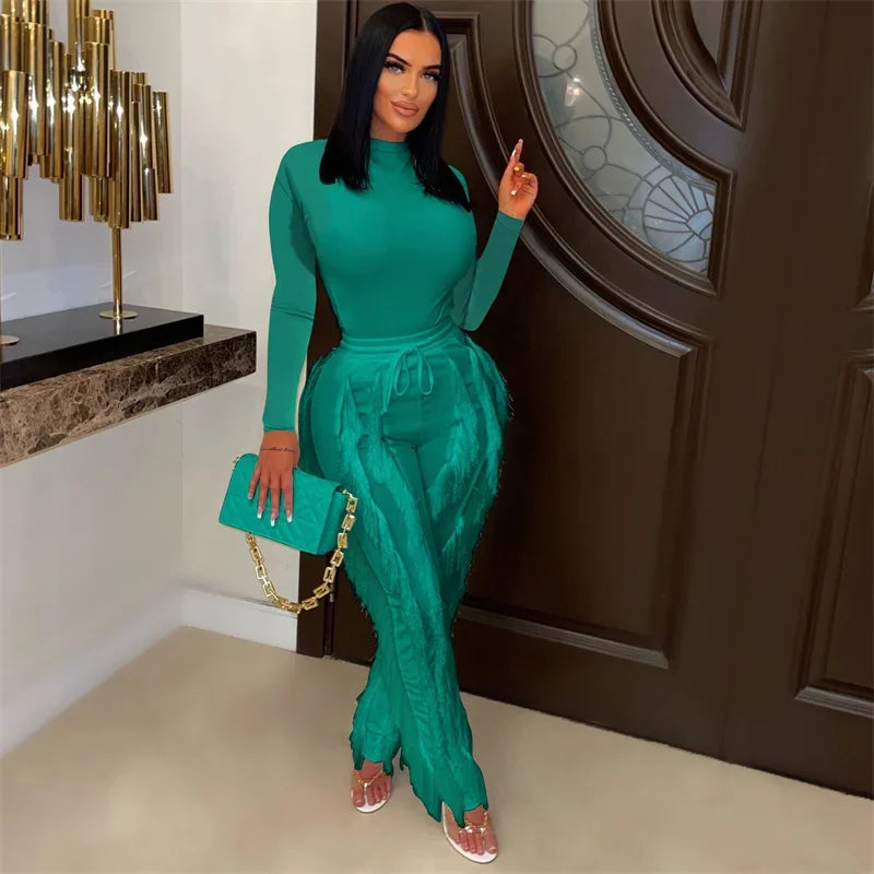 Elegant women's 2-piece fall winter outfit by JN Fashion Fusion featuring a long sleeve bodysuit top and tassel pants.