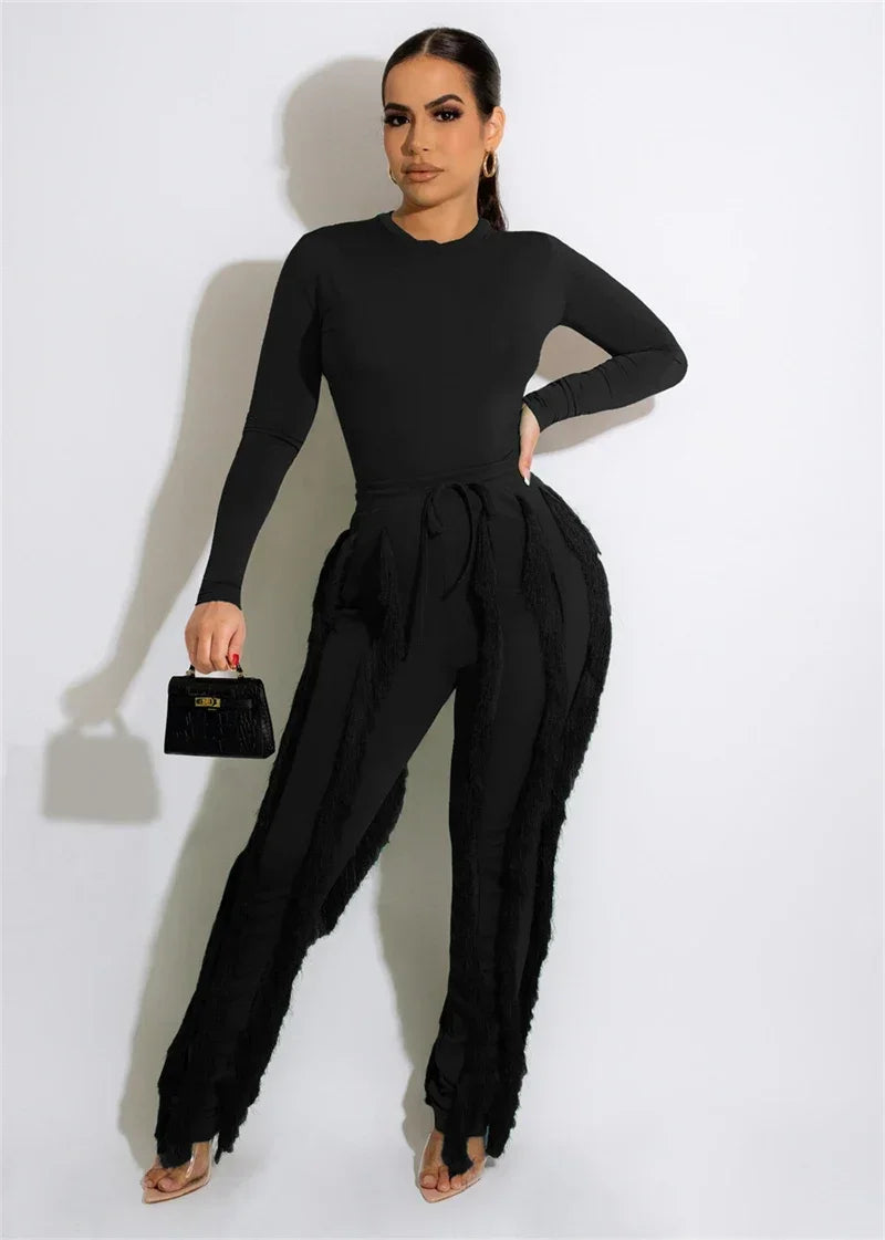 Elegant women's 2-piece fall winter outfit with long sleeve bodysuit top and tassel pants by JN Fashion Fusion.