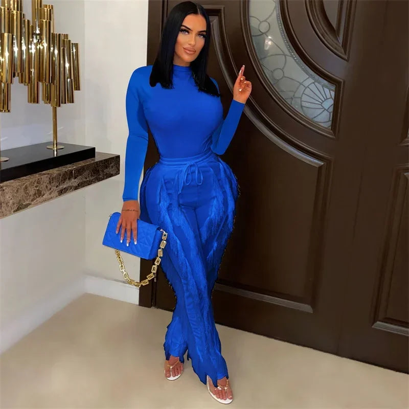 Elegant 2-piece women's fall winter outfit with long sleeve bodysuit top and tassel pants by JN Fashion Fusion.
