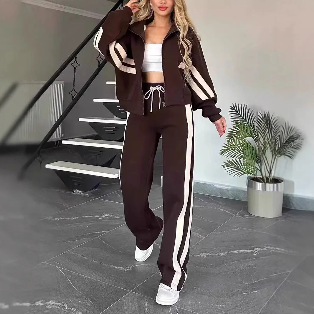 Ladies stripe tracksuit 2-piece set with zip-up crop jacket and high waist wide-leg sweatpants from JN Fashion Fusion.