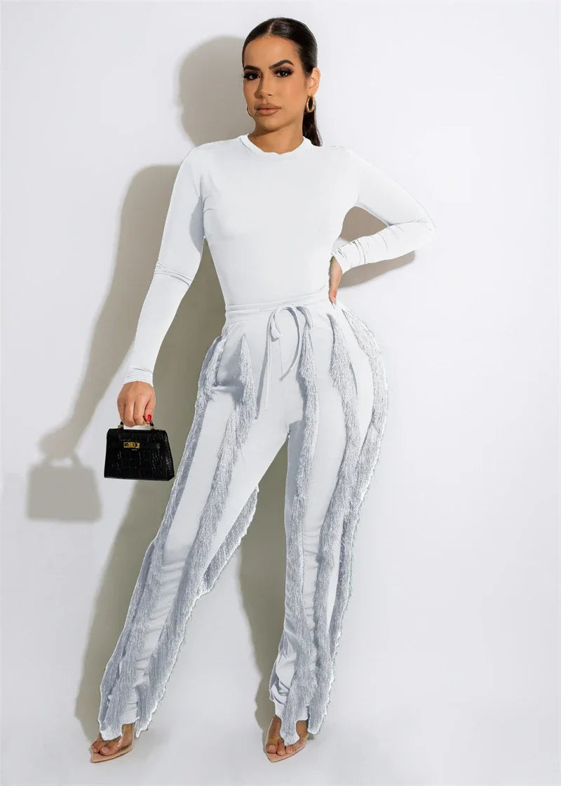 Elegant women's 2-piece fall winter outfit with long sleeve bodysuit top and tassel pants, by JN Fashion Fusion.