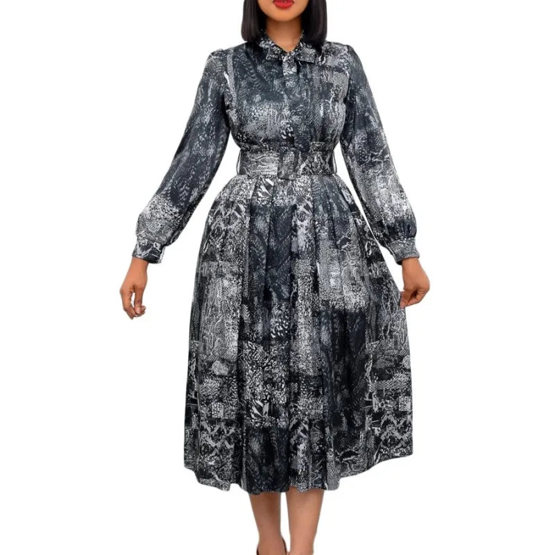 African women's dress by JN Fashion Fusion featuring a vibrant dashiki-style design, pleated midi silhouette, suitable for spring and summer events.