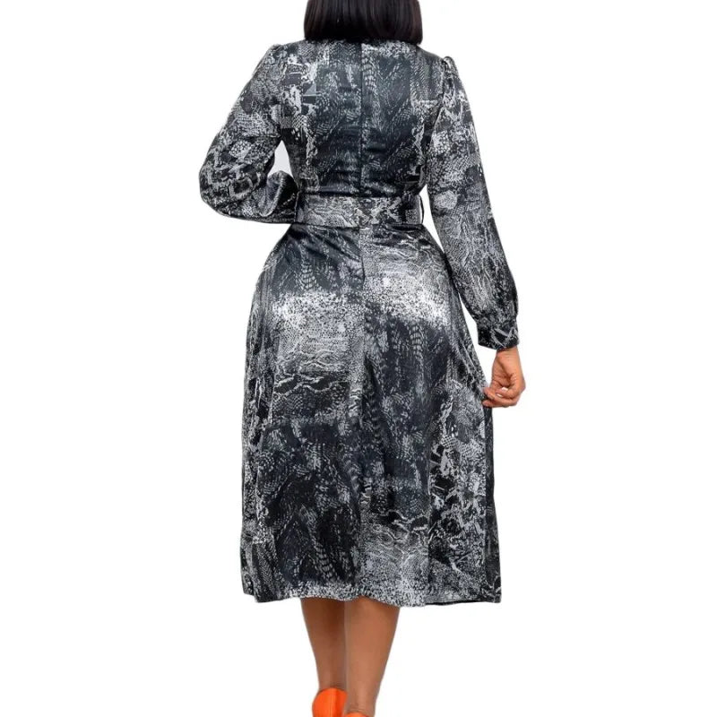 Elegant African party dress for women featuring a pleated dashiki-inspired design by JN Fashion Fusion, perfect for spring and summer events.