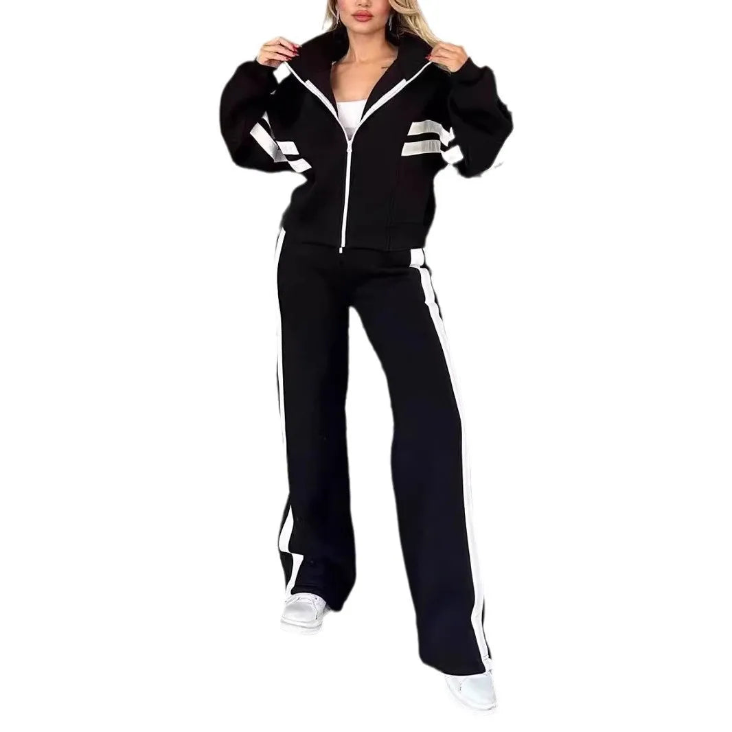 Ladies stripe tracksuit set by JN Fashion Fusion featuring a zip-up crop jacket and high-waist wide-leg sweatpants.