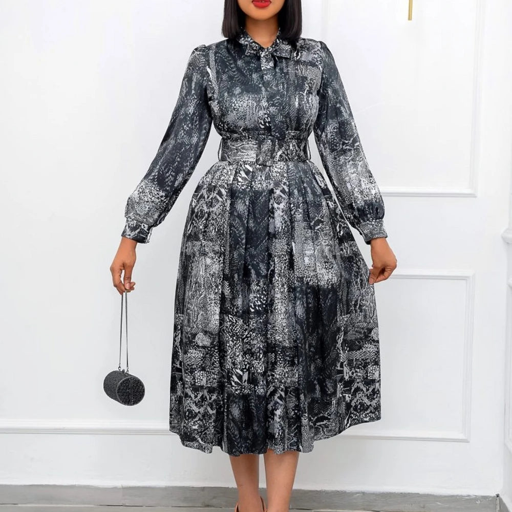 Elegant African women's dress by JN Fashion Fusion featuring a pleated dashiki-inspired design and midi length for spring and summer.