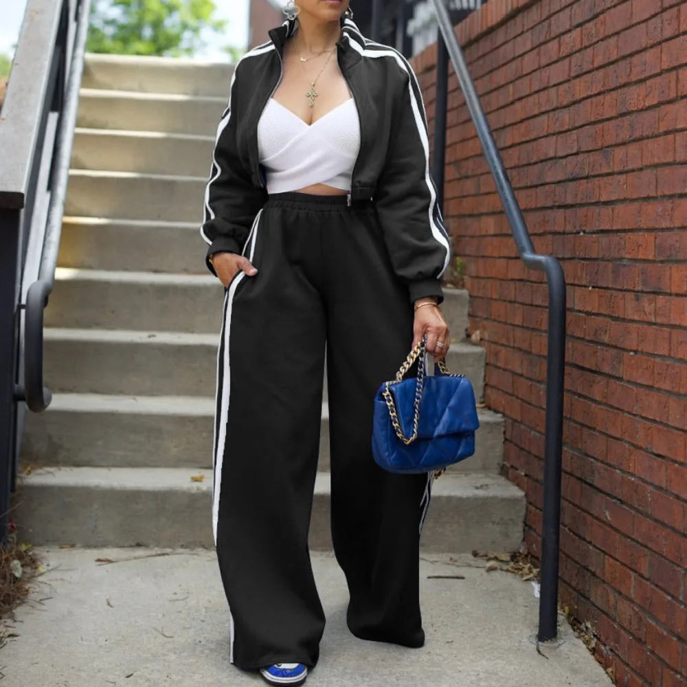 Women’s wide-leg pants suit by JN Fashion Fusion, striped jacket and floor-length trousers, casual autumn 2-piece ensemble.