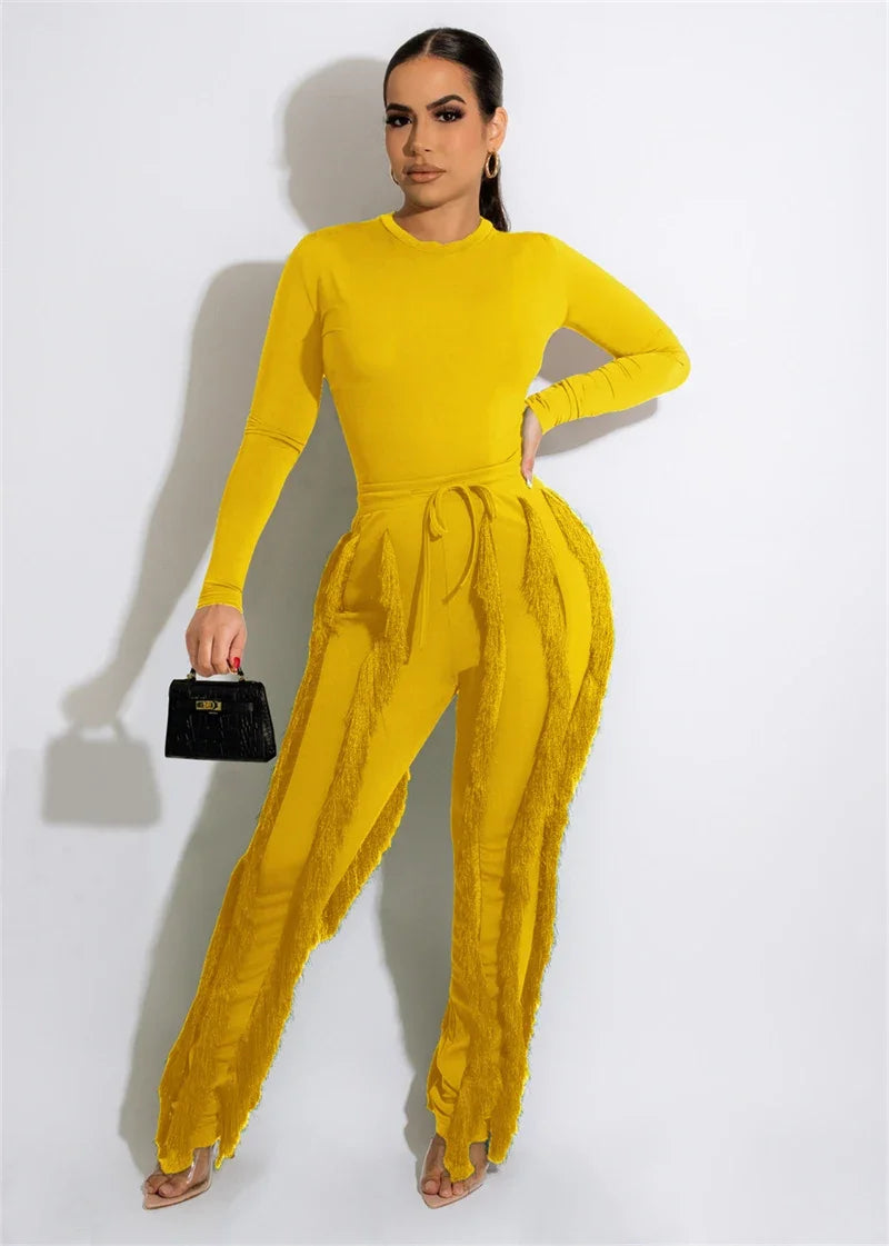 Elegant 2-piece women's fall winter outfit with long sleeve bodysuit top and tassel pants by JN Fashion Fusion.