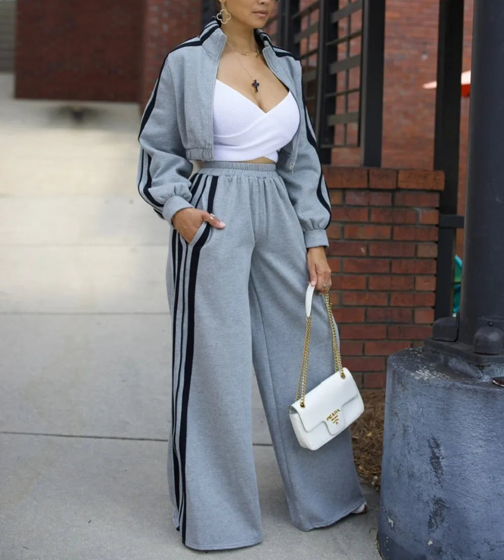 Women’s wide-leg pants suit by JN Fashion Fusion, striped jacket with floor-length trousers, casual autumn 2-piece ensemble.