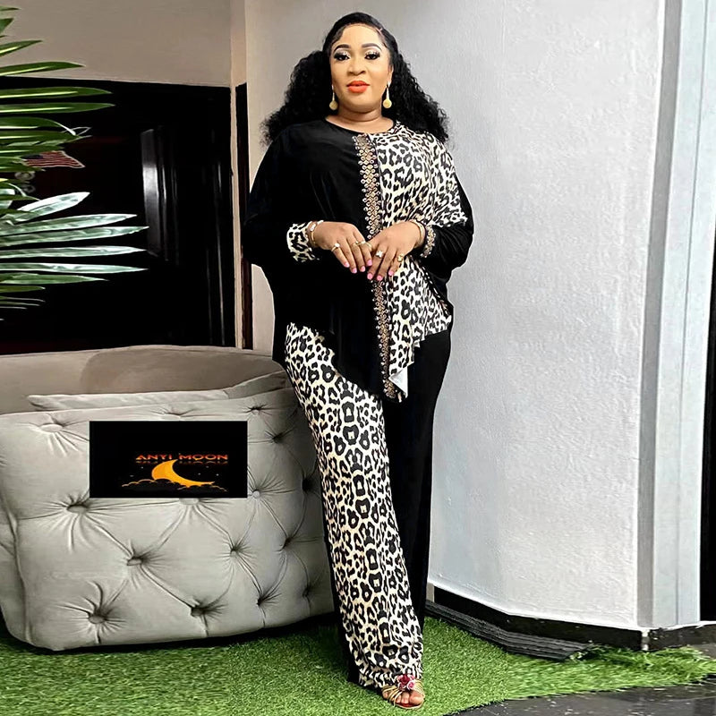 African fashion two-piece leopard print patchwork batwing sleeve top and loose pants set by JN Fashion Fusion.