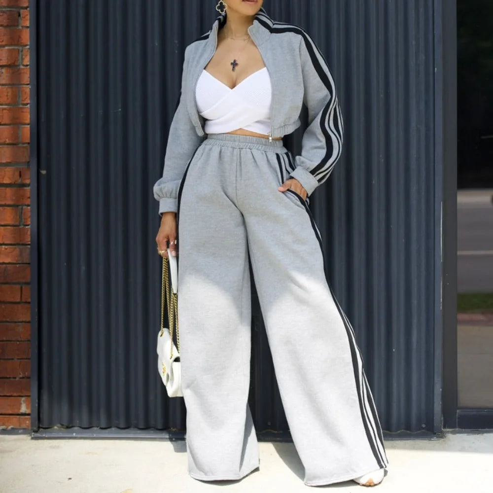 Women wide leg pants suit by JN Fashion Fusion with striped jacket and floor-length trousers, casual autumn 2-piece ensemble.